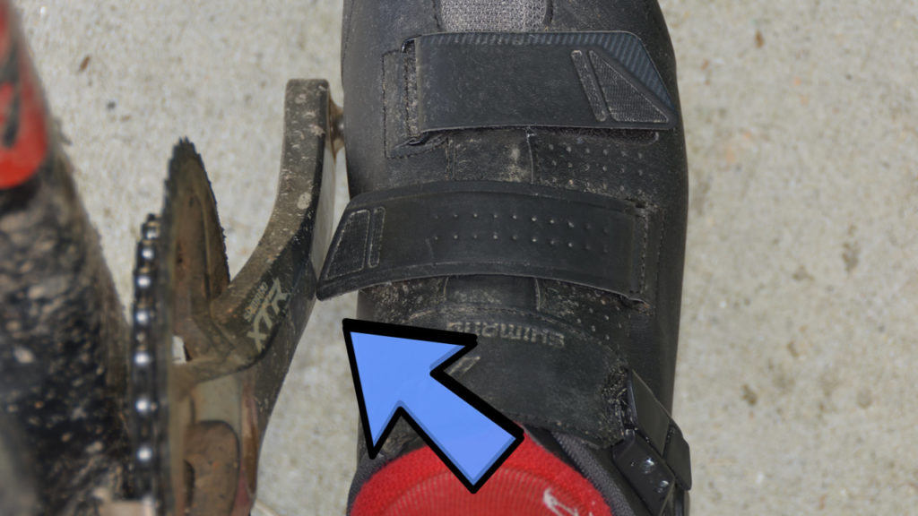 See how the end of the Velcro strap hits the crank arm?