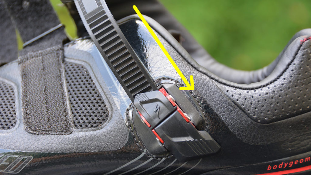 A traditional cycling shoe buckle