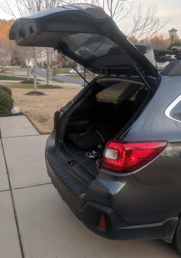 2019 Subaru Outback with the rear gate open.