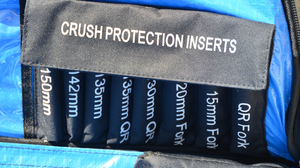 Axle crush protection inserts come with the Chain Reaction Cycles Pro Bike Bag