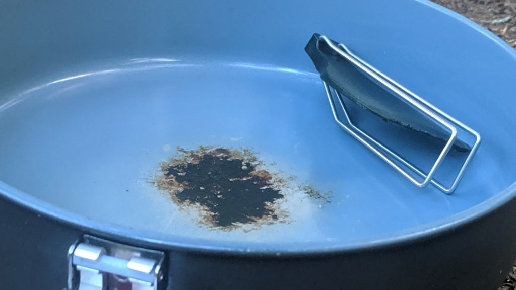 A patch of stuck on food in the MSR Windburner Ceramic Skillet