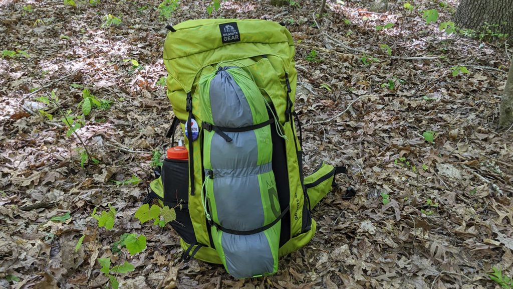 The gear straps on the Granite Gear Crown2 let you carry your tent outside the bag.